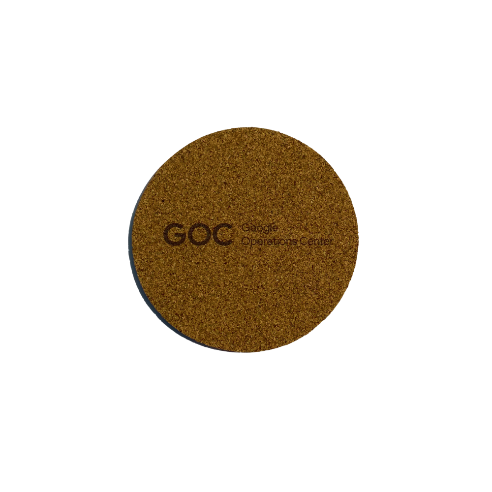 Round brown coaster with 'GOC' logo on a white background