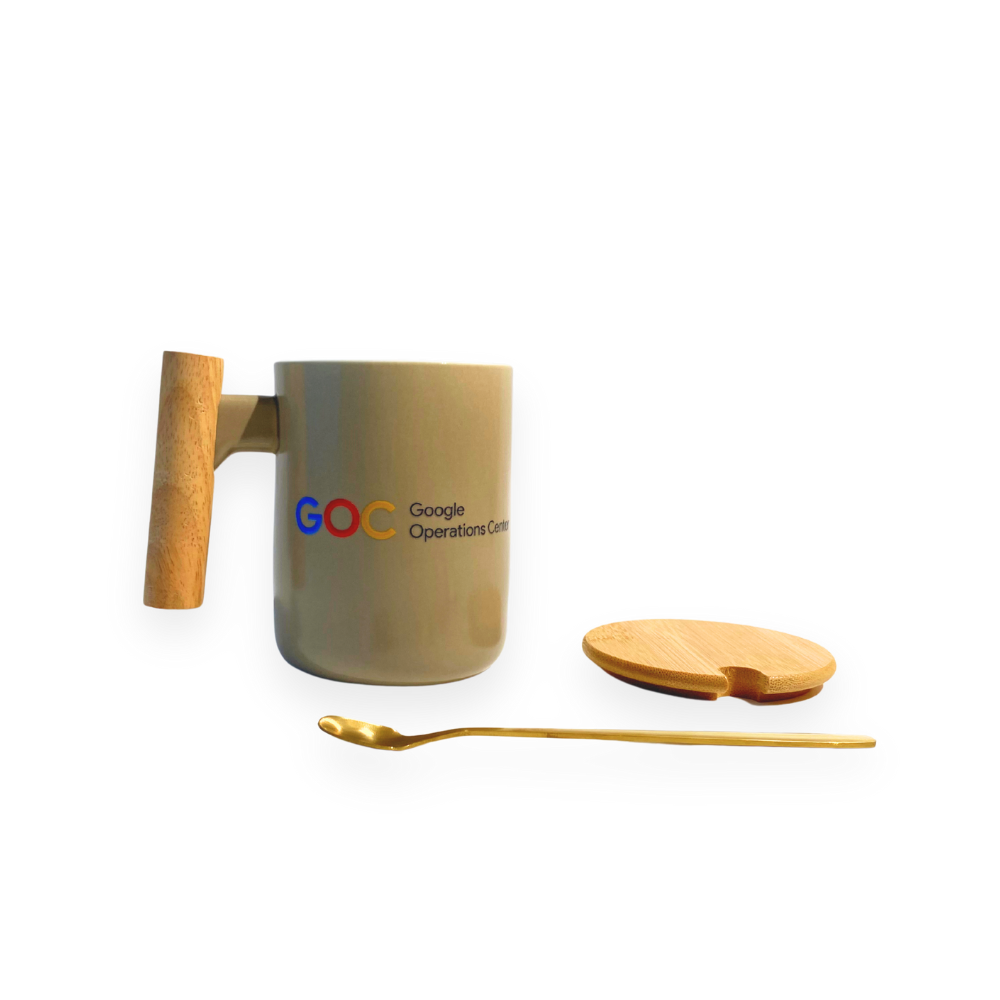 Mug with wooden handle, spoon, and lid on a white background